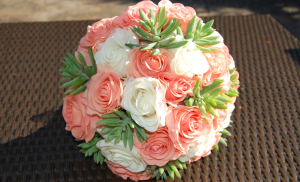 Coral-and-cream-roses-and-succulents-bridal-bouquet-top